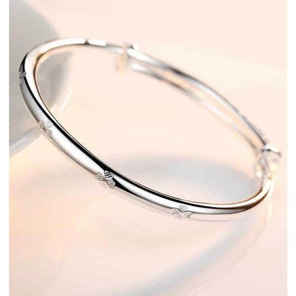 Unbranded Jewelry - Adjustable Silver-Tone Four Clover Bracelet, STAMPED 999 silver color Bangle